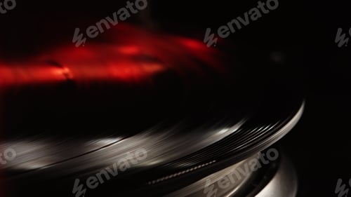 Preview: Retro-styled spinning record vinyl player. Close up. Rotating vintage phonograph close up.