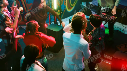 Preview: Cheerful men and women partying together