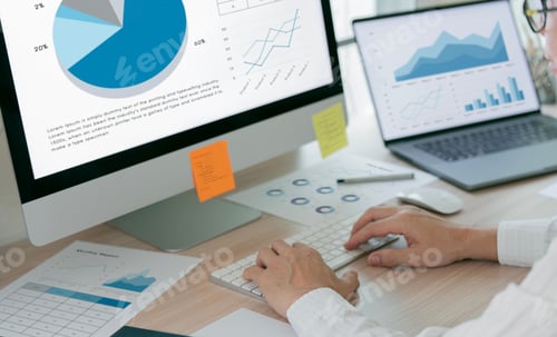 Preview: Businessman using desktop computer analyze business growth graph and Marketing strategy planning