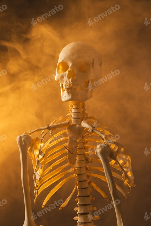 Preview: Vertical image of plastic skeleton and smoke with copy space on black background