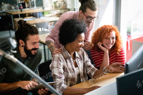 Preview: Group of business people and software developers working as a team in office