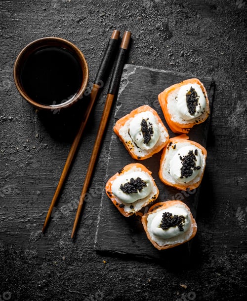Preview: Fresh rolls with salmon, cream cheese and caviar.