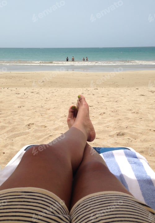 Preview: Front view of the ocean while lounging on a sandy beach in Puerto Rico.