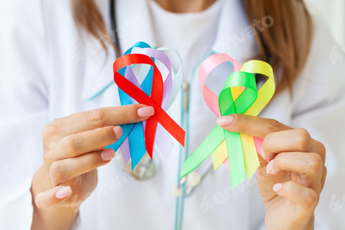 Preview: Female doctor holds colored ribbons symbolize awareness of various diseases