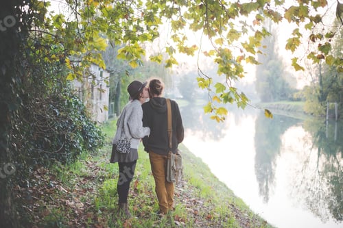 Preview: Young couple by riverbank, Dolo, Venice, Italy