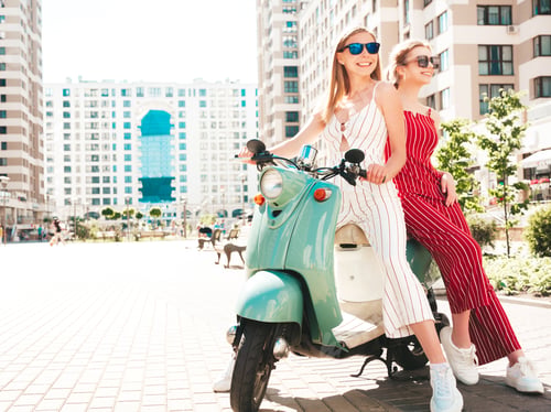 Preview: Two young beautiful woman posing outdoors