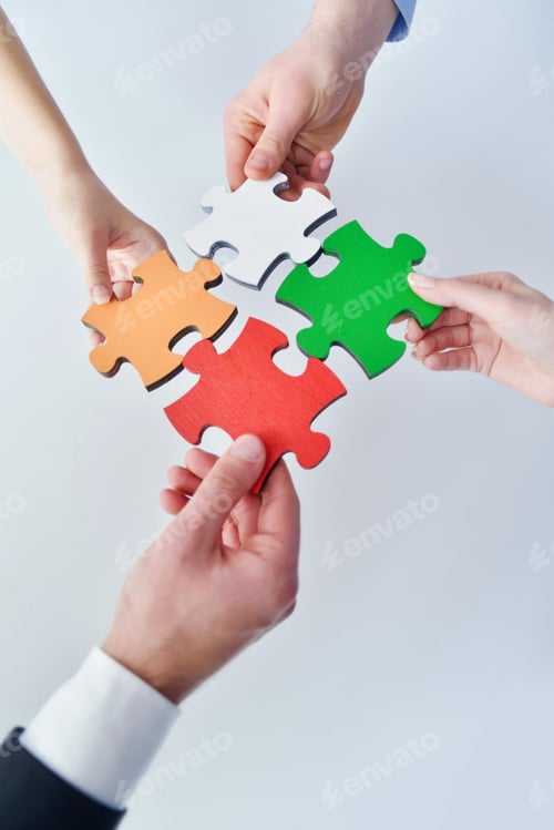 Preview: Group Of Business People Assembling Jigsaw Puzzle And Represent Team Support And Help Concept