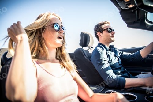 Preview: Couple on convertible car