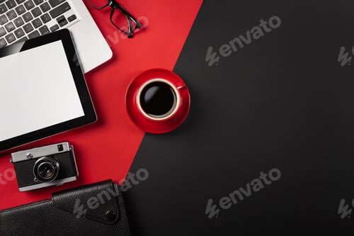 Preview: Laptop on a black desktop with a cup of coffee, a phone and a wi-fi sign, work in social networks.