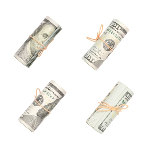 Preview: Several bundles of US dollars isolated on white background
