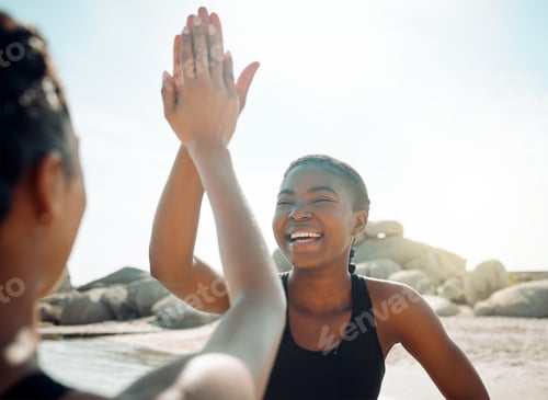Preview: Are you ready to do this. Shot of two friends high fiving after a workout.