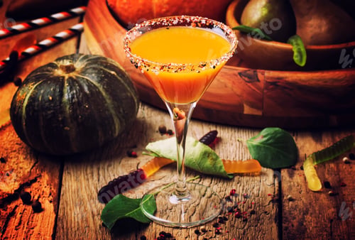 Preview: Halloween orange cocktail on a dark festive autumn background, selective focus and shallow DOF