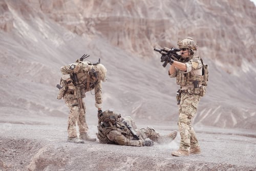 Preview: Soldiers in camouflage military uniforms carrying weapons Reconnaissance missions in rugged mountain