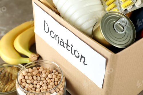 Preview: Concept of donate with donation box, close up