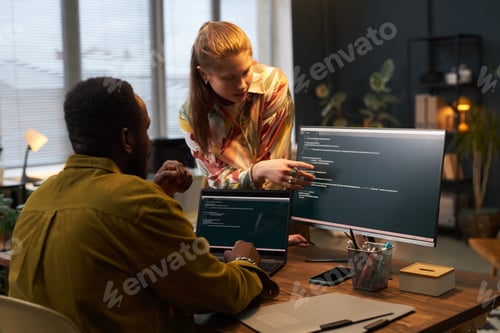 Preview: Colleagues Typing Codes In Team