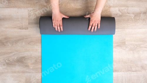 Preview: Elevate view female hands in sportswear doing healthy yoga in the house indoor