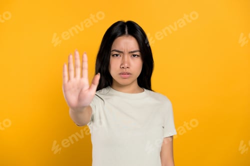 Preview: Chinese woman show to the camera gesture STOP