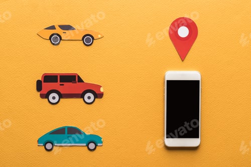Preview: top view of paper cut cars, location mark near smartphone with blank screen on orange background