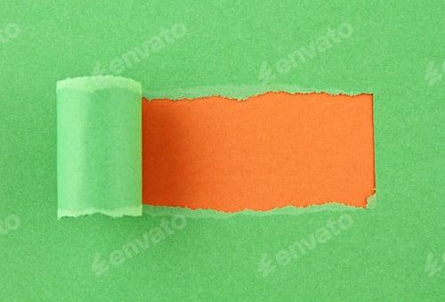 Preview: Torn colored paper, hole in the sheet of paper