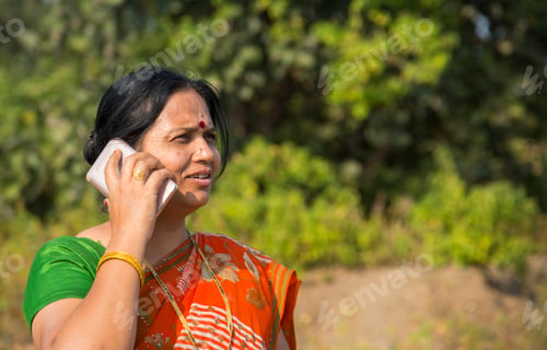 Preview: Indian woman talking on smartphone.