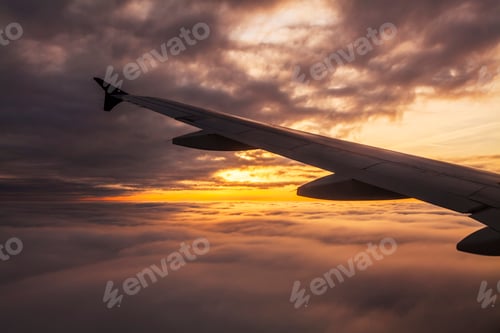 Preview: Beautiful sunset. View from the plane window
