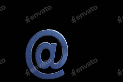 Preview: blue at symbol on black background