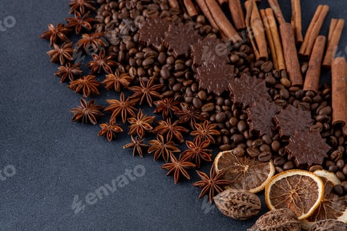 Preview: Food background. Coffee beans, cinnamon sticks, anise stars and chocolate candies.