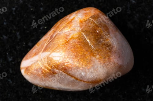 Preview: sample of tumbled iridescent feldspar on black
