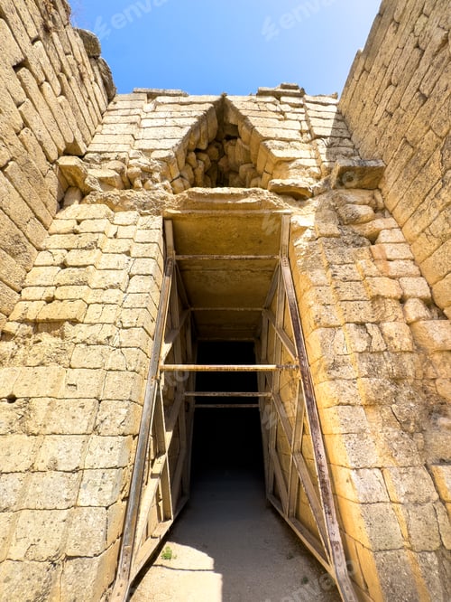Preview: Mycenae, Greece. Tomb of Clytemnestra at the archaeological site, blue sky, sunny day