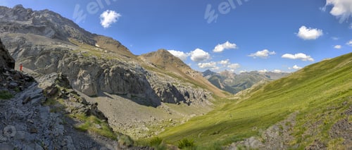 Preview: Panoramic view of a valley surrounded by majestic mountains. Ordesa y Monte Perdido National Park.