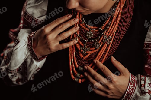 Preview: Ukrainian woman in legacy ancient coral beads, Zgarda. Authentic traditional.