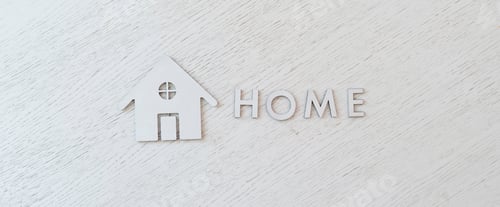 Preview: a flat lay cut letters and home icon sign, view from above on table