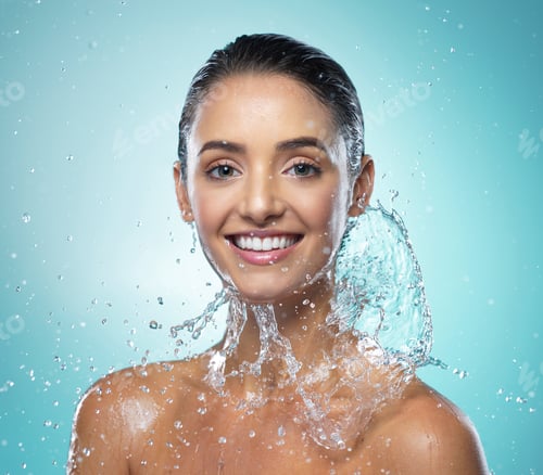 Vista previa: Skin so soft youd be envious. Shot of a young woman taking a shower against a blue background.