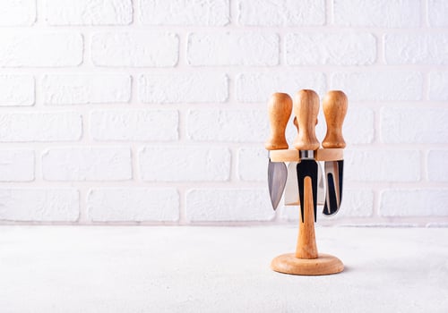 Preview: Cheese knives on white background
