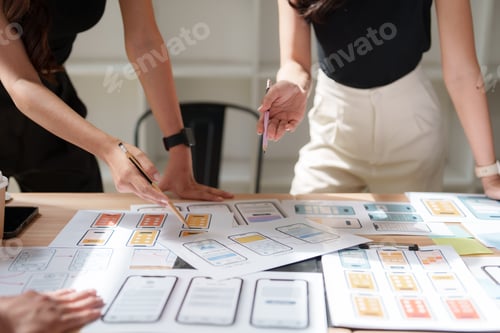 Preview: Developers collaborating on mobile app interface ui ux design