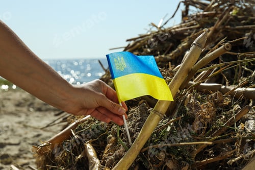 Preview: The flag of Ukraine against the background of water pollution with plastic waste and garbage
