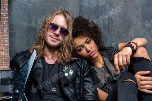 Preview: portrait of young stylish man and woman in love