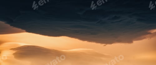 Preview: Dramatic asperitas cloud and dark sunset sky