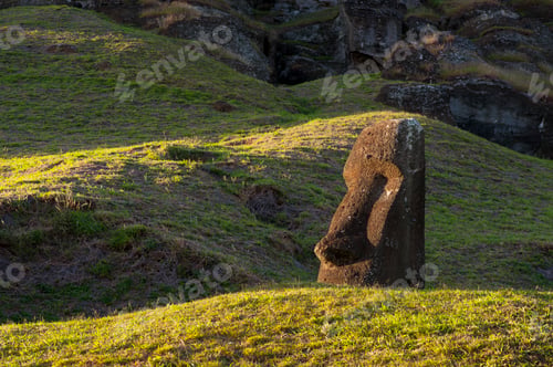 Preview: Moai statue basks in the golden light of a setting sun on Easter Island.