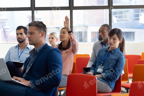 Preview: Business professionals at a conference