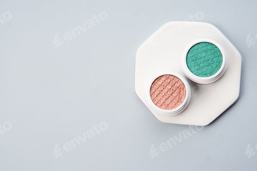 Preview: eyeshadow on a white stand on a gray background cosmetics makeup