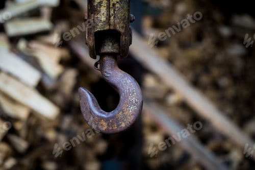Preview: Rusty Hook and Metal Machinery Piece Close-Up