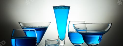 Preview: Banner of Many glasses with blue champagne or cocktail.