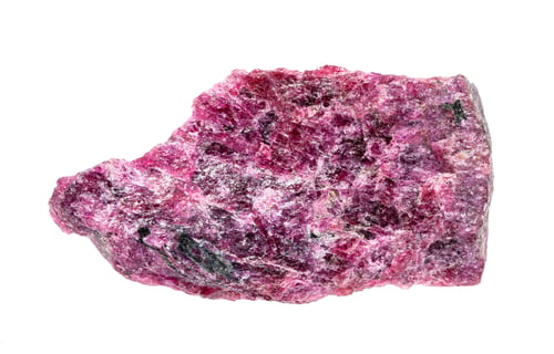 Preview: unpolished eudialyte rock isolated on white
