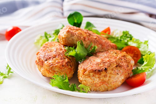 Preview: Meatballs with cabbage. Lazy cabbage rolls with fresh salad on light background. Russian cuisine.