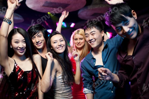 Preview: Stylish young people dancing in nightclub