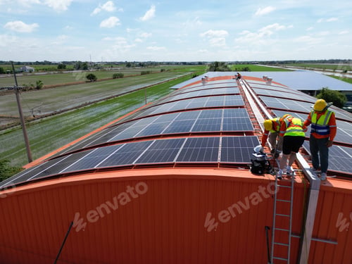Preview: engineer man inspects construction of solar cell panel or photovoltaic cell at roof top