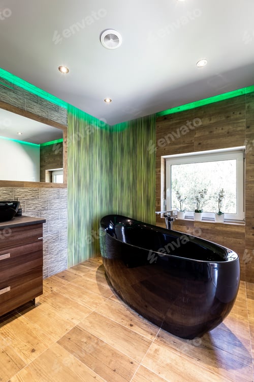 Preview: Travertine bathroom with black bath