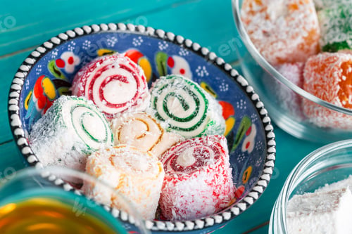 Preview: various pieces of turkish delight lokum and black tea