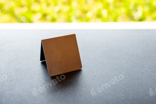 Preview: Mock up stainless menu frame, empty table tent stand on the table